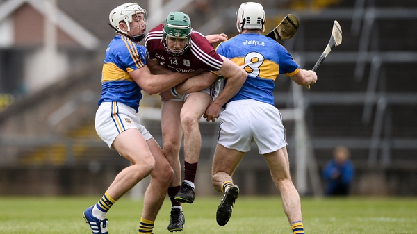 Ronan (L) and Brendan Maher (R) tackle Cathal Mannion in the 2017 League final