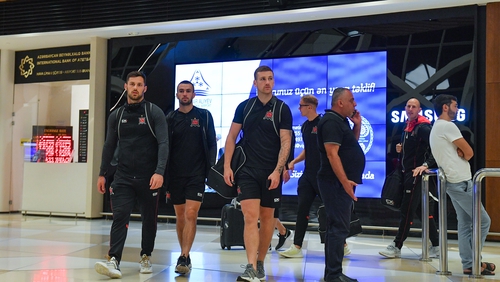 Dundalk players, from left, Patrick Hoban, Michael Duffy arrive at Heydar Aliyev International Airport in Baku