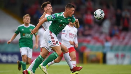 Dan Casey of Cork City in action against Dean Clarke of St Patrick's Athletic
