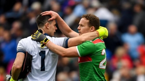 Veterans Stephen Cluxton and Andy Moran share a moment after the game