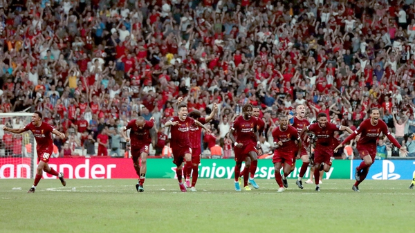 Liverpool celebrate their win following a penalty shootout