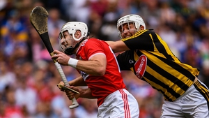 Walsh gets a tackle in on Cork's Horgan