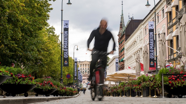 A cyclist in Oslo, a city slowly but surely reducing the number of cars in its city centre. Photo: Fredrik Varfjell/AFP/Getty Images