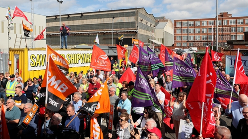 Harland and Wolff workers and supporters attend a rally outside the shipyard