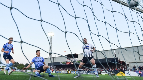 Michael Duffy slots home Dundalk's second goal in their win over UCD