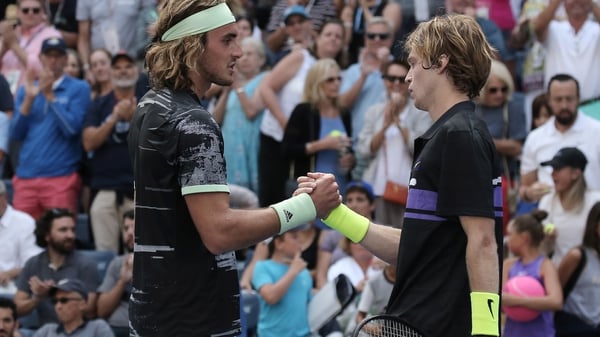 Andrey Rublev of Russia (r) and Stefanos Tsitsipas of Greece