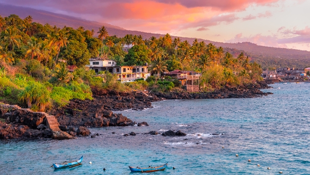 Sunset boats in holiday paradise resort on Grand Comore island