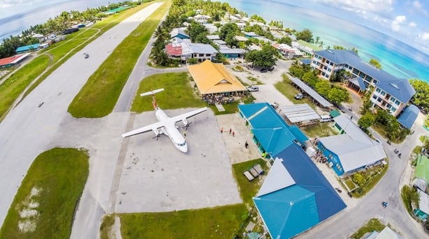 An airplane on the apron of Tuvalu international airport