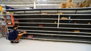 An empty supermarket shelf in Orlando after people stocked up ahead of Hurricane Dorian's arrival