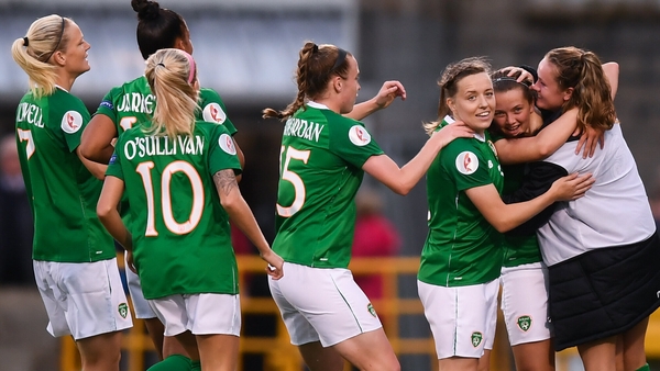 Tyler Toland is mobbed after scoring the opening goal for Ireland.