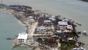 A handout photo made available by the US Coast Guard shows an aerial view of damaged structures in the Bahamas