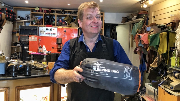 Jim Brennan repairs sleeping bags for homeless people