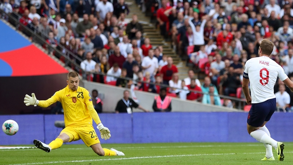 Harry Kane slots home his first goal against Bulgaria