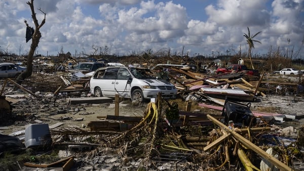 A vehicle sits amid the mud and destruction left by Hurricane Dorian in Marsh Harbour, Bahamas