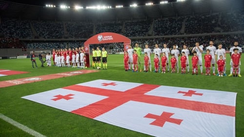 Georgia and Denmark players lineup ahead of the 0-0 draw in Tbilisi