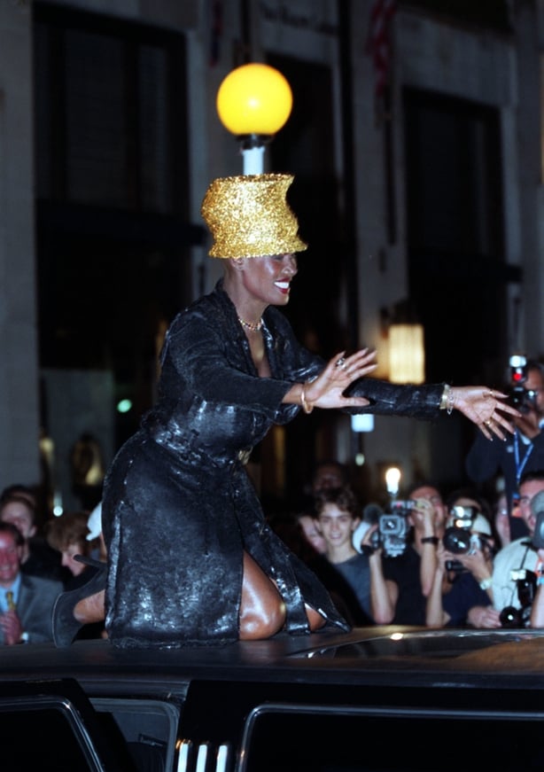 Grace Jones wears a hat creation by Philip Treacy whilst on the roof of a stretch Limousine (William Conran/PA)