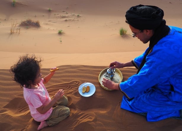 Nellie Huang and her family in the Sahara Desert (Nellie Huang/PA)