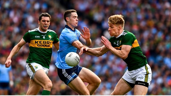 Brian Fenton in action against Tommy Walsh and David Moran during the drawn game