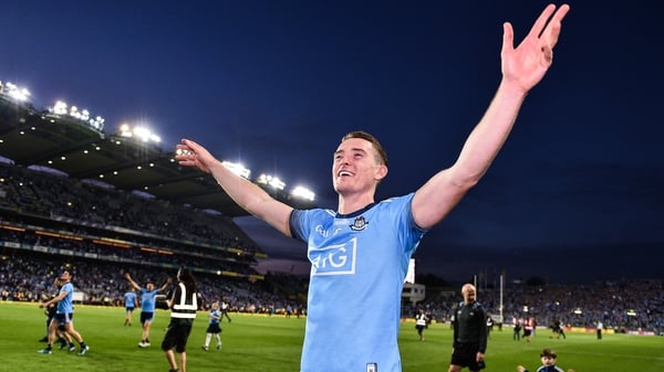 The Dubs midfielder greets fans after the final whistle