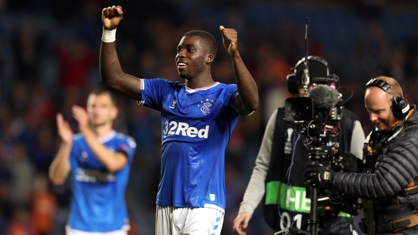 Goal scorer Sheyi Ojo celebrates victory at the full-time whistle at Ibrox