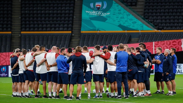 England team in a huddle at the Sapporo Dome