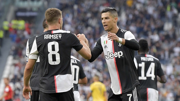 Ramsey and Ronaldo celebrate a goal for Juventus in their 2-1 victory