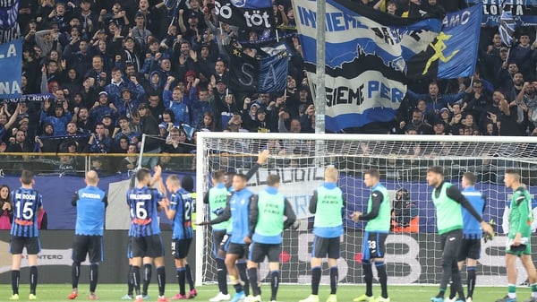 Atalanta players in front of their fans at Stadio Ennio Tardini