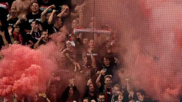 Hungarian fans set off flares