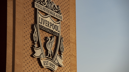 The club crest on a wall outside their Anfield home