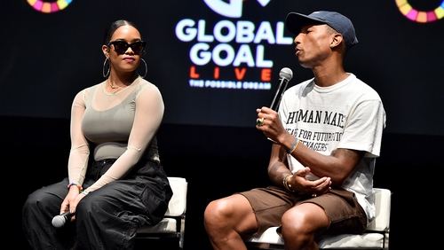 H.E.R. and Pharrell Williams at the launch