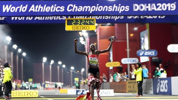 Ruth Chepngetich of Kenya celebrates after crossing the finish line