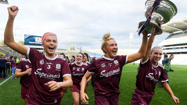 Sarah Dervan, left, Shauna Healy, centre, and Niamh Kilkenny of Galway celebrate with the O'Duffy Cup