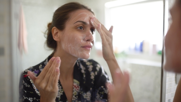 Woman washing face