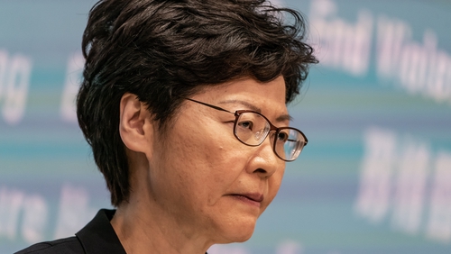 Carrie Lam told journalists it was "too early" to say whether the anti-mask law was effective or not