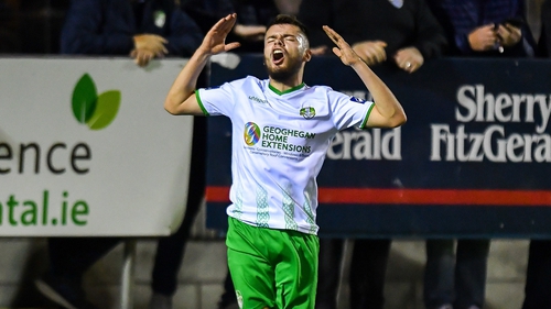 Paul Fox of Cabinteely reacts after going close