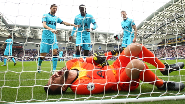 Lloris was left writhing in pain after Brighton's first goal