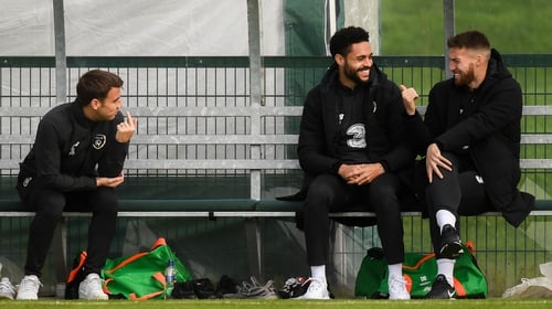 Matt Doherty share a joke with Seamus Coleman and Derrick Williams at the Ireland training session