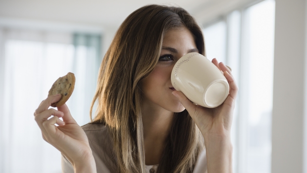 woman eating biscuit