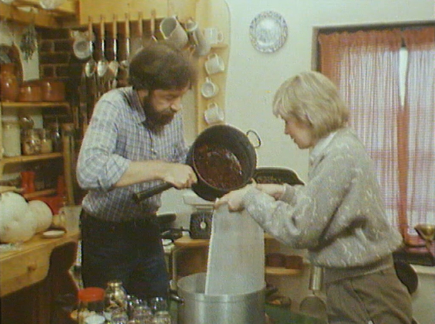 Straining cooked berries and apples to make a jelly (1984)