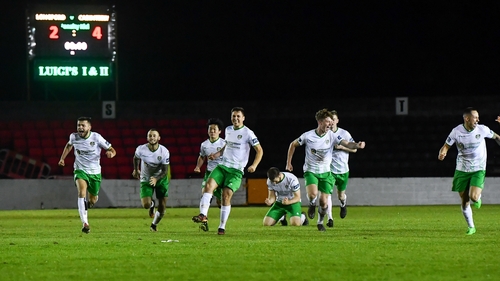 Cabinteely players celebrate the win