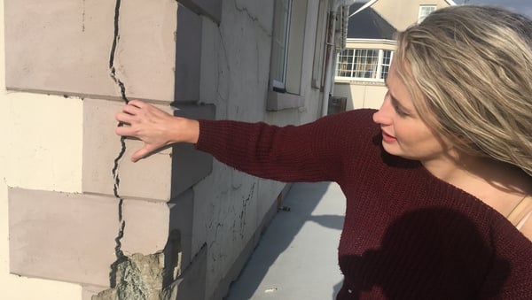 Christina Crumlish shows off some of the cracks in her north Donegal home caused by Mica