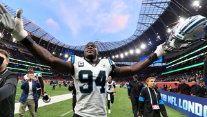 Efe Obada of the Carolina Panthers leaves the field