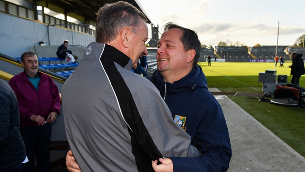 Sixmilebridge manager Tim Crowe and coach Davy Fitzgerald embrace after guiding their club to glory in the Clare SHC