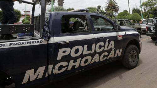 Gunmen kill 14 police in Mexico