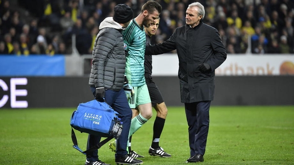David de Gea (C) leaves the pitch in Stockholm