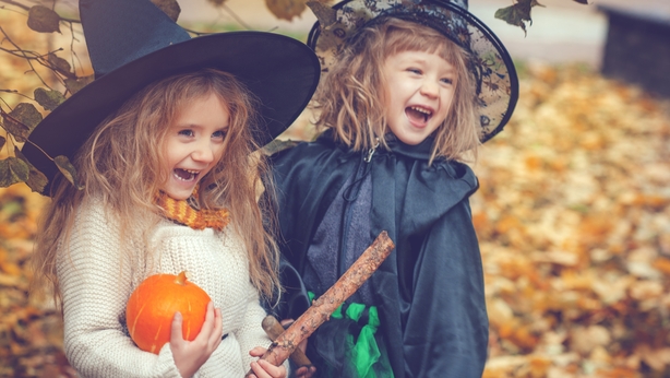 Little girls dressed as witch at Halloween