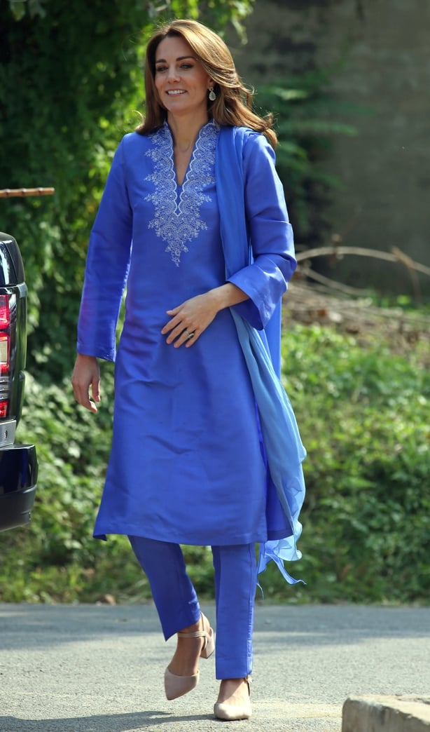 The Duke and Duchess of Cambridge during a visit to a school in central Islamabad