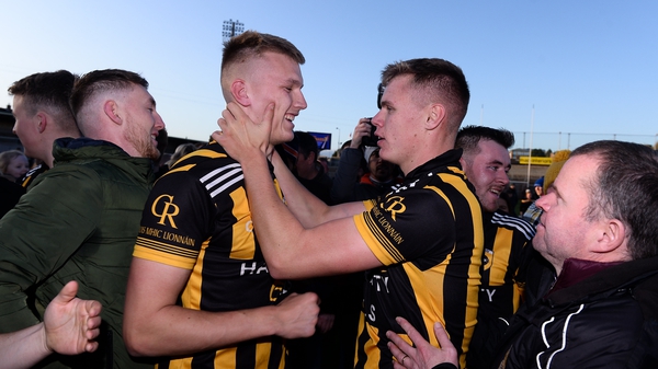 Brothers Rian and Oisin O'Neill celebrate after Crossmaglen came from behind to win yet another Armagh SFC title