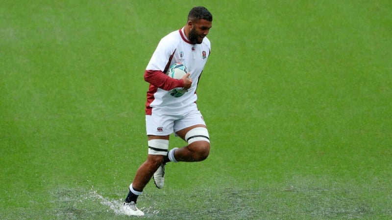 Brodie Retallick Lewis Ludlam of England splashes through a puddle during the captain's run