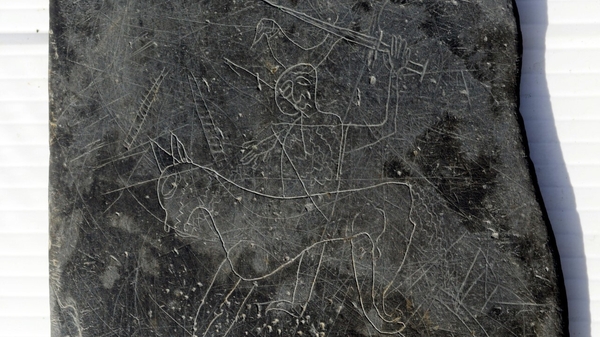 The slate was carved with graffitti dating back to the 12th Century